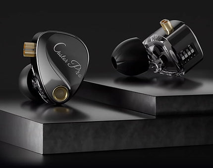 High-end earbud headphones on a black platform with a dark background