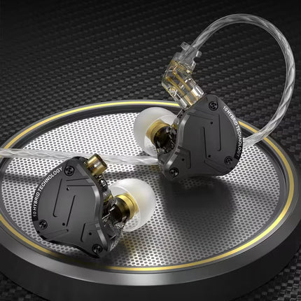 Two black and transparent KZ ZS10 Pro X in-ear monitors with clear cables