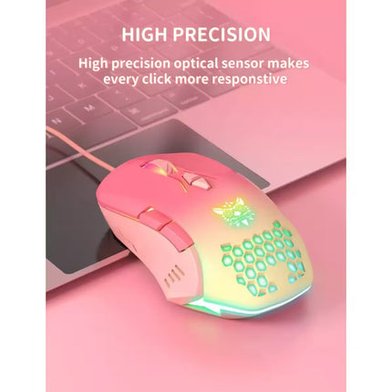 A pink and yellow gradient gaming mouse with RGB lighting rests on a pink desk next to a laptop. Text at the top reads 'HIGH PRECISION' and 'High precision optical sensor makes every click more responsive'.
