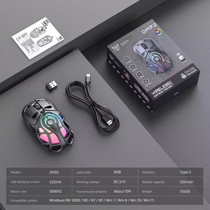 A black gaming mouse with RGB rainbow lighting is shown with its retail box, USB cable, and small USB receiver on a dark gray surface. A small instruction sheet is also present.