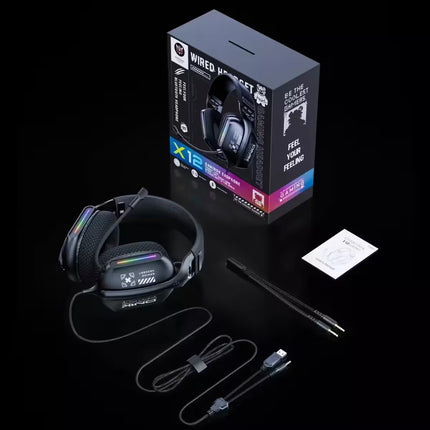 A wired gaming headset with an attached microphone, shown with its retail box, cables, and a small instruction card on a black background.